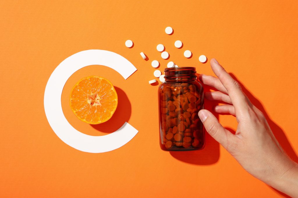 Vitamin C in a bottle in the form of tablets.
